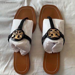 Tory Burch sandals.